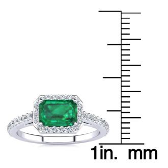 1 1/4 Carat Emerald and Halo Diamond Ring In 14 Karat White Gold