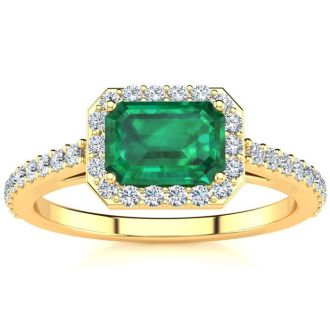 1 1/4 Carat Emerald and Halo Diamond Ring In 14 Karat Yellow Gold