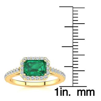 1 1/4 Carat Emerald and Halo Diamond Ring In 14 Karat Yellow Gold