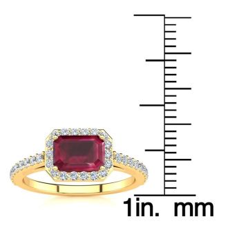 1 1/3 Carat Ruby and Halo Diamond Ring In 14 Karat Yellow Gold