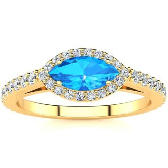 1 Carat Marquise Shape Blue Topaz and Halo Diamond Ring In 14 Karat Yellow Gold