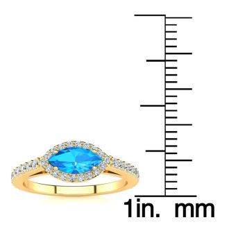 1 Carat Marquise Shape Blue Topaz and Halo Diamond Ring In 14 Karat Yellow Gold