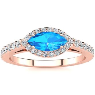 1 Carat Marquise Shape Blue Topaz and Halo Diamond Ring In 14 Karat Rose Gold