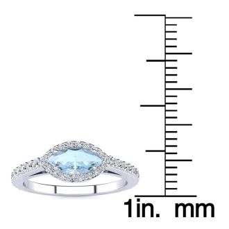 Aquamarine Ring: Aquamarine Jewelry: 3/4 Carat Marquise Shape Aquamarine and Halo Diamond Ring In 14 Karat White Gold