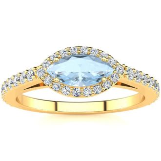 Aquamarine Ring: Aquamarine Jewelry: 3/4 Carat Marquise Shape Aquamarine and Halo Diamond Ring In 14 Karat Yellow Gold