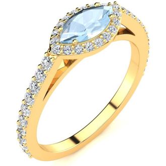 Aquamarine Ring: Aquamarine Jewelry: 3/4 Carat Marquise Shape Aquamarine and Halo Diamond Ring In 14 Karat Yellow Gold