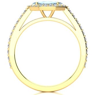 Aquamarine Ring: Aquamarine Jewelry: 3/4 Carat Marquise Shape Aquamarine and Halo Diamond Ring In 14 Karat Yellow Gold