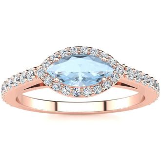 Aquamarine Ring: Aquamarine Jewelry: 3/4 Carat Marquise Shape Aquamarine and Halo Diamond Ring In 14 Karat Rose Gold