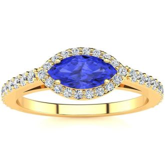 3/4 Carat Marquise Shape Tanzanite and Halo Diamond Ring In 14 Karat Yellow Gold