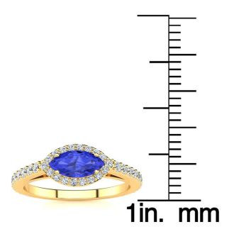 3/4 Carat Marquise Shape Tanzanite and Halo Diamond Ring In 14 Karat Yellow Gold