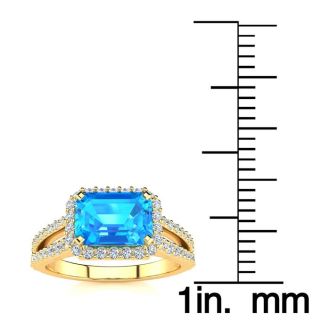 1 1/2 Carat Antique Blue Topaz and Halo Diamond Ring In 14 Karat Yellow Gold