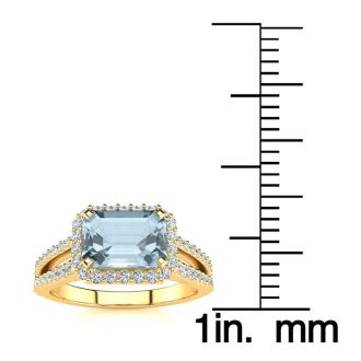 Aquamarine Ring: Aquamarine Jewelry: 1 1/3 Carat Antique Aquamarine and Halo Diamond Ring In 14 Karat Yellow Gold