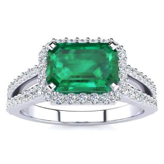 1 1/3 Carat Antique Emerald and Halo Diamond Ring In 14 Karat White Gold
