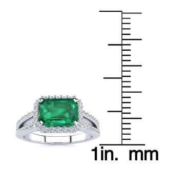 1 1/3 Carat Antique Emerald and Halo Diamond Ring In 14 Karat White Gold
