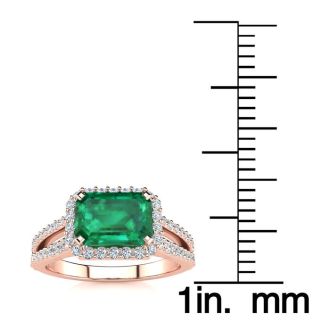 1 1/3 Carat Antique Emerald and Halo Diamond Ring In 14 Karat Rose Gold