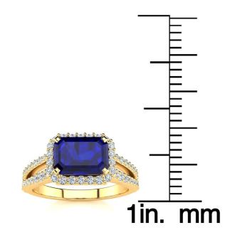 1 1/2 Carat Antique Sapphire and Halo Diamond Ring In 14 Karat Yellow Gold