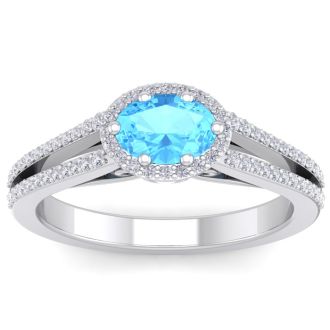 1 1/2 Carat Oval Shape Antique Blue Topaz and Halo Diamond Ring In 14 Karat White Gold