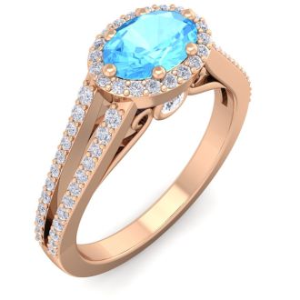 1 1/2 Carat Oval Shape Antique Blue Topaz and Halo Diamond Ring In 14 Karat Rose Gold