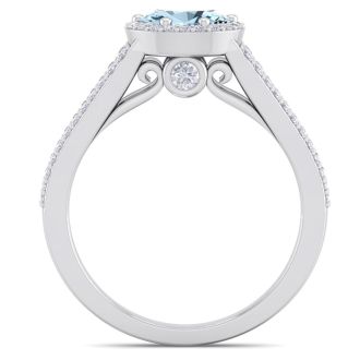 Aquamarine Ring: Aquamarine Jewelry: 1 1/4 Carat Oval Shape Antique Aquamarine and Halo Diamond Ring In 14 Karat White Gold