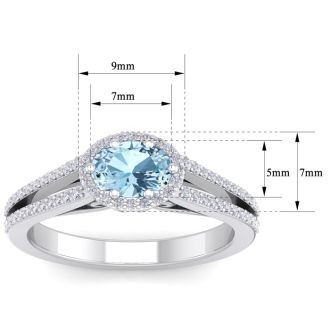 Aquamarine Ring: Aquamarine Jewelry: 1 1/4 Carat Oval Shape Antique Aquamarine and Halo Diamond Ring In 14 Karat White Gold