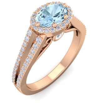 Aquamarine Ring: Aquamarine Jewelry: 1 1/4 Carat Oval Shape Antique Aquamarine and Halo Diamond Ring In 14 Karat Rose Gold