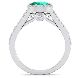 1 1/4 Carat Oval Shape Antique Emerald and Halo Diamond Ring In 14 Karat White Gold
