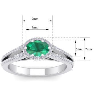 1 1/4 Carat Oval Shape Antique Emerald and Halo Diamond Ring In 14 Karat White Gold