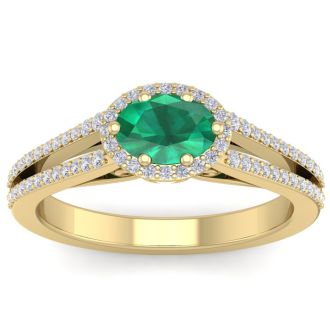 1 1/4 Carat Oval Shape Antique Emerald and Halo Diamond Ring In 14 Karat Yellow Gold
