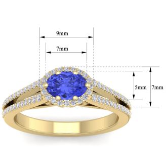1 1/3 Carat Oval Shape Antique Tanzanite and Halo Diamond Ring In 14 Karat Yellow Gold