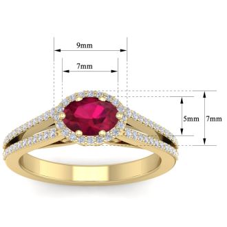 1 1/3 Carat Oval Shape Antique Ruby and Halo Diamond Ring In 14 Karat Yellow Gold