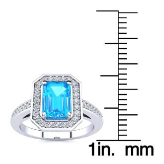 1 1/2 Carat Blue Topaz and Halo Diamond Ring In 14 Karat White Gold
