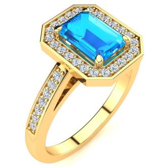 1 1/2 Carat Blue Topaz and Halo Diamond Ring In 14 Karat Yellow Gold