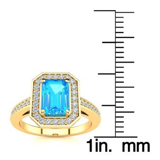 1 1/2 Carat Blue Topaz and Halo Diamond Ring In 14 Karat Yellow Gold