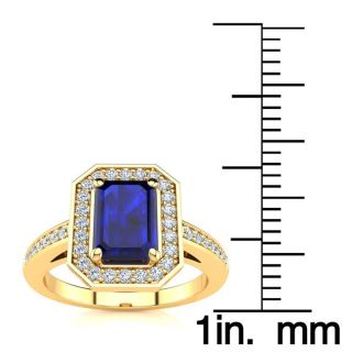 1 1/3 Carat Sapphire and Halo Diamond Ring In 14 Karat Yellow Gold