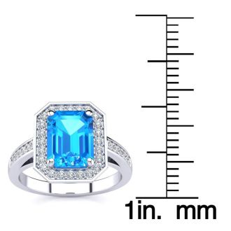 2 1/4 Carat Blue Topaz and Halo Diamond Ring In 14 Karat White Gold