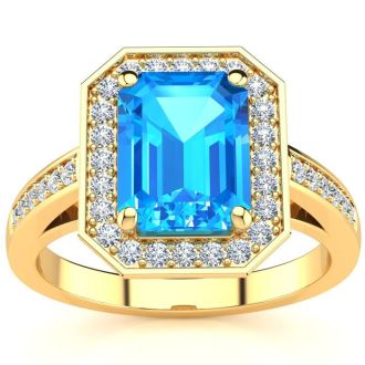 2 1/4 Carat Blue Topaz and Halo Diamond Ring In 14 Karat Yellow Gold