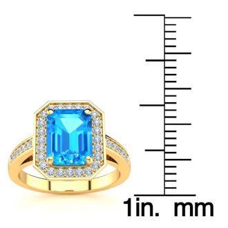 2 1/4 Carat Blue Topaz and Halo Diamond Ring In 14 Karat Yellow Gold