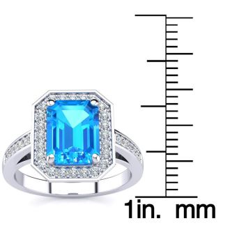3 Carat Blue Topaz and Halo Diamond Ring In 14 Karat White Gold