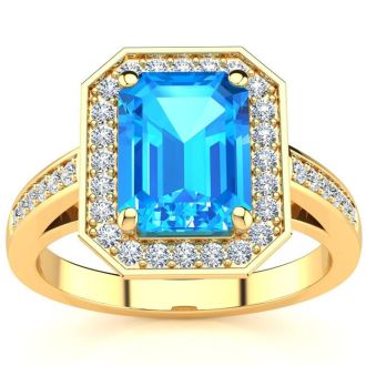 3 Carat Blue Topaz and Halo Diamond Ring In 14 Karat Yellow Gold