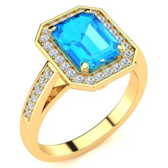 3 Carat Blue Topaz and Halo Diamond Ring In 14 Karat Yellow Gold