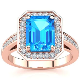 3 Carat Blue Topaz and Halo Diamond Ring In 14 Karat Rose Gold