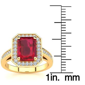 3 1/3 Carat Ruby and Halo Diamond Ring In 14 Karat Yellow Gold