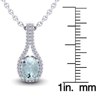 Aquamarine Necklace: Aquamarine Jewelry: 1 1/3 Carat Oval Shape Aquamarine and Halo Diamond Necklace In 14 Karat White Gold, 18 Inches
