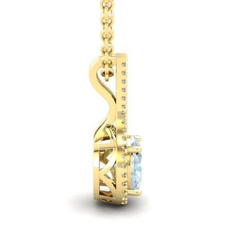 Aquamarine Necklace: Aquamarine Jewelry: 1 1/3 Carat Oval Shape Aquamarine and Halo Diamond Necklace In 14 Karat Yellow Gold, 18 Inches
