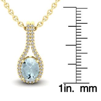 Aquamarine Necklace: Aquamarine Jewelry: 1 1/3 Carat Oval Shape Aquamarine and Halo Diamond Necklace In 14 Karat Yellow Gold, 18 Inches
