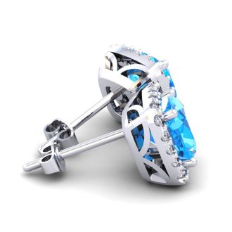 2 1/2 Carat Cushion Cut Blue Topaz and Halo Diamond Stud Earrings In 14 Karat White Gold