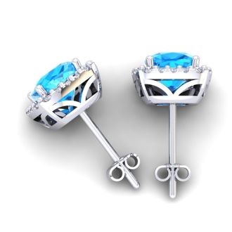 2 1/2 Carat Cushion Cut Blue Topaz and Halo Diamond Stud Earrings In 14 Karat White Gold