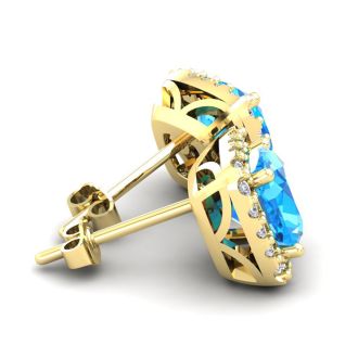 2 1/2 Carat Cushion Cut Blue Topaz and Halo Diamond Stud Earrings In 14 Karat Yellow Gold