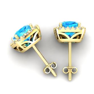 2 1/2 Carat Cushion Cut Blue Topaz and Halo Diamond Stud Earrings In 14 Karat Yellow Gold