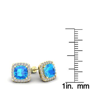 2 1/2 Carat Cushion Cut Blue Topaz and Halo Diamond Stud Earrings In 14 Karat Yellow Gold